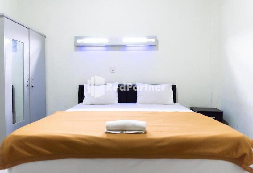 Hotell Wisma Aini Syariah Mitra Reddoorz