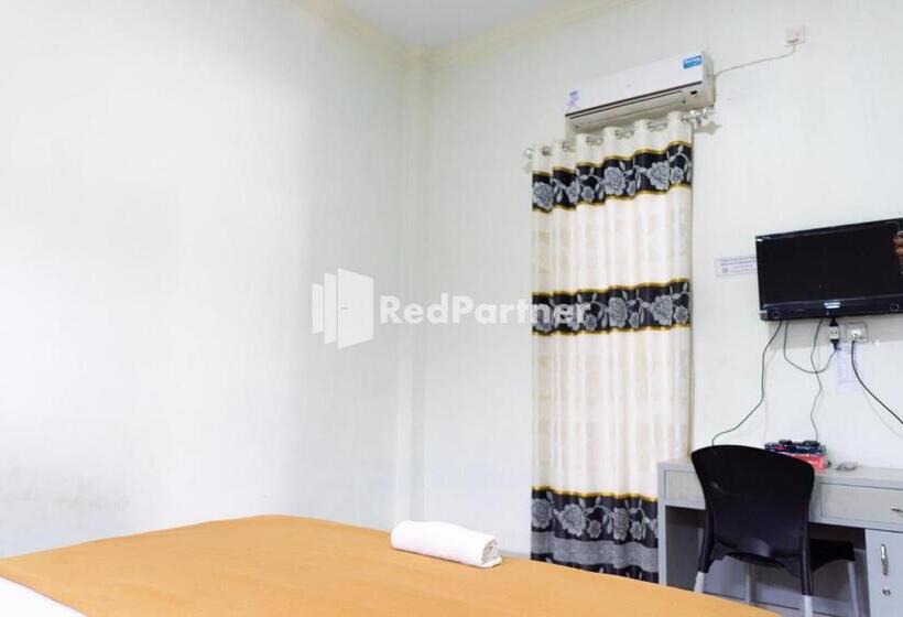 Hotell Wisma Aini Syariah Mitra Reddoorz