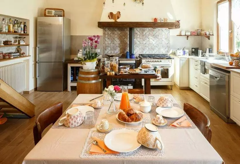 تختخواب و صبحانه Il Pettirosso