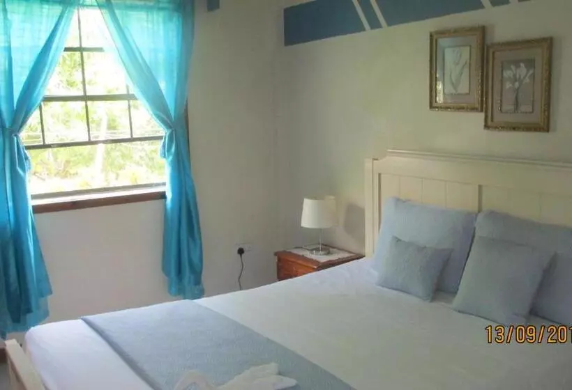 هتل Tropical Breeze Vacation Home And Apartments