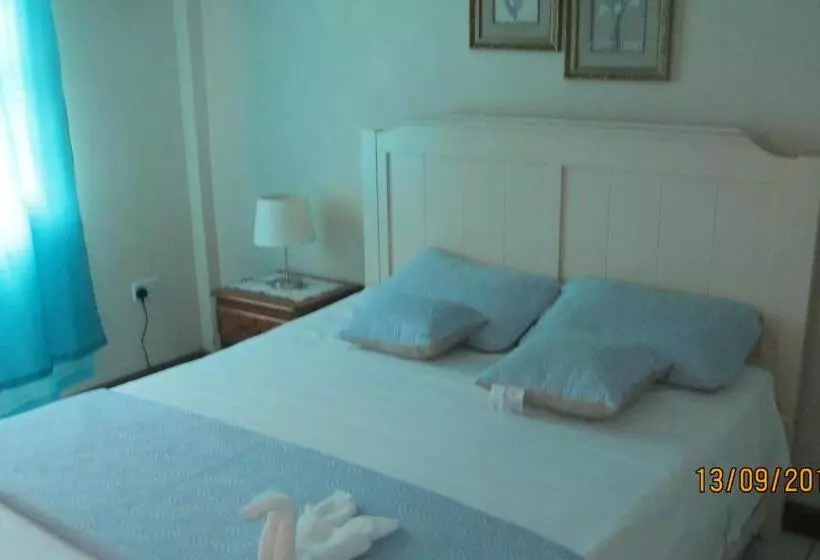 هتل Tropical Breeze Vacation Home And Apartments