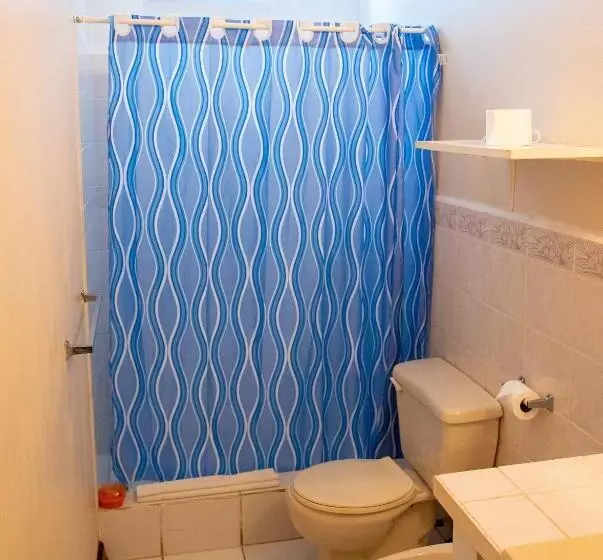 هتل Tropical Breeze Vacation Home And Apartments