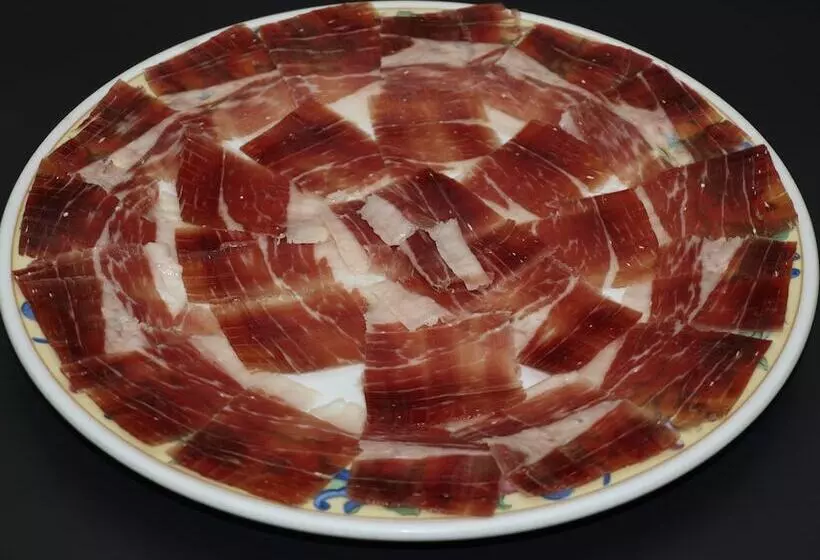 ホテル Hostal Restaurante El Paisano