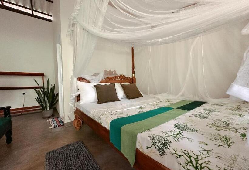 צימר Midigama Inn