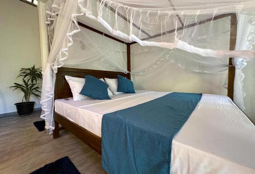 צימר Midigama Inn