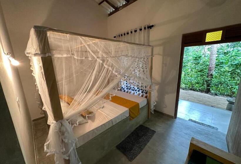 צימר Midigama Inn