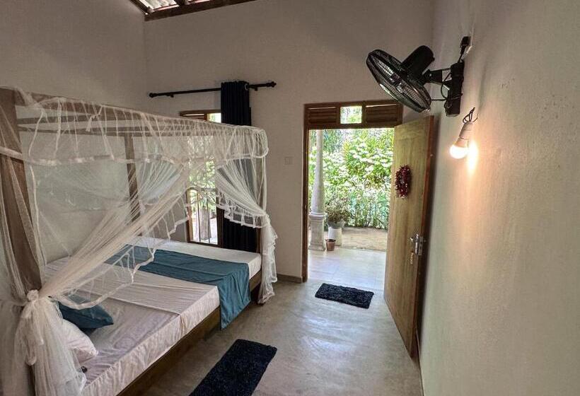 צימר Midigama Inn