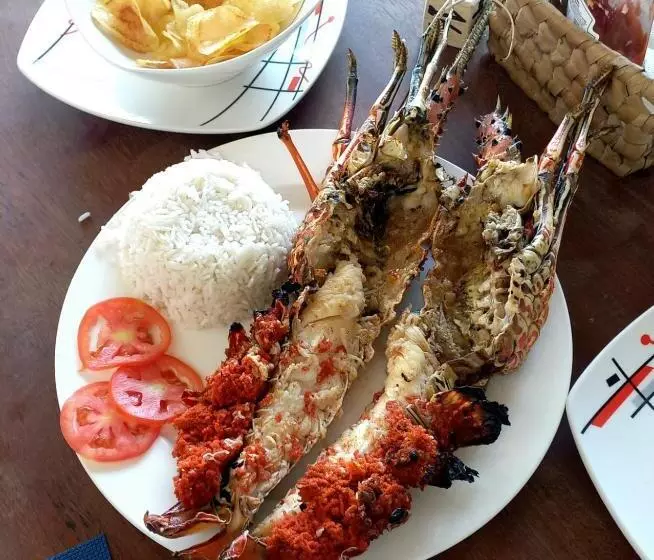 تختخواب و صبحانه Luwa Beach&suits