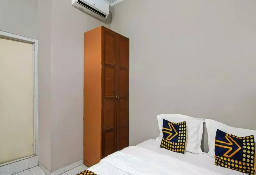 ホテル Spot On 91958 Flamboyan 25 Homestay Syariah