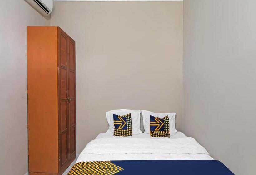 בית מלון כפרי Spot On 91958 Flamboyan 25 Homestay Syariah