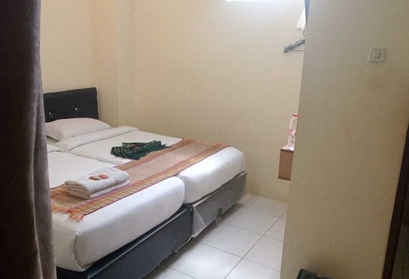 בית מלון כפרי Penginapan Mutiara Syariah