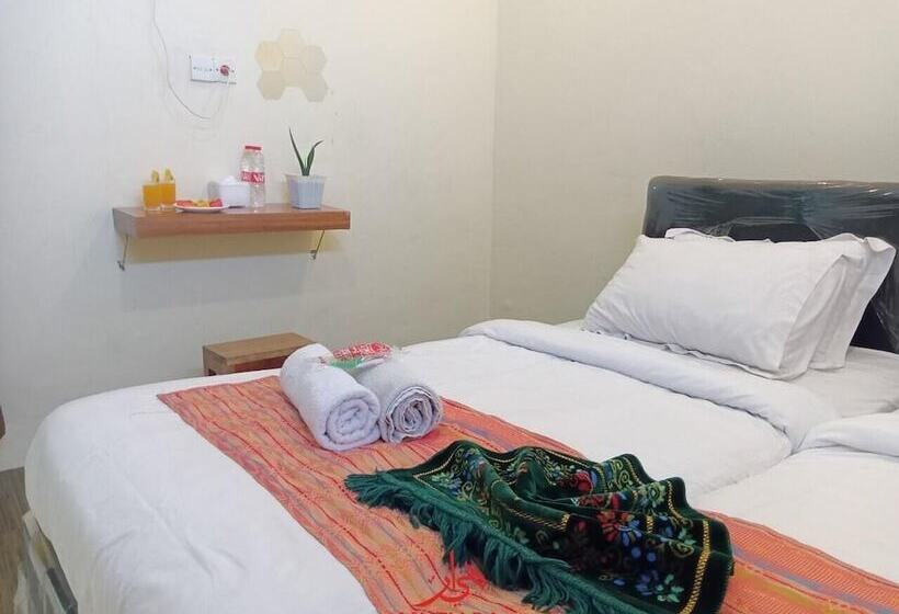 בית מלון כפרי Penginapan Mutiara Syariah