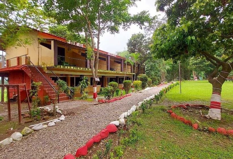 Отель Corbett Tiger Tejomaya Resort