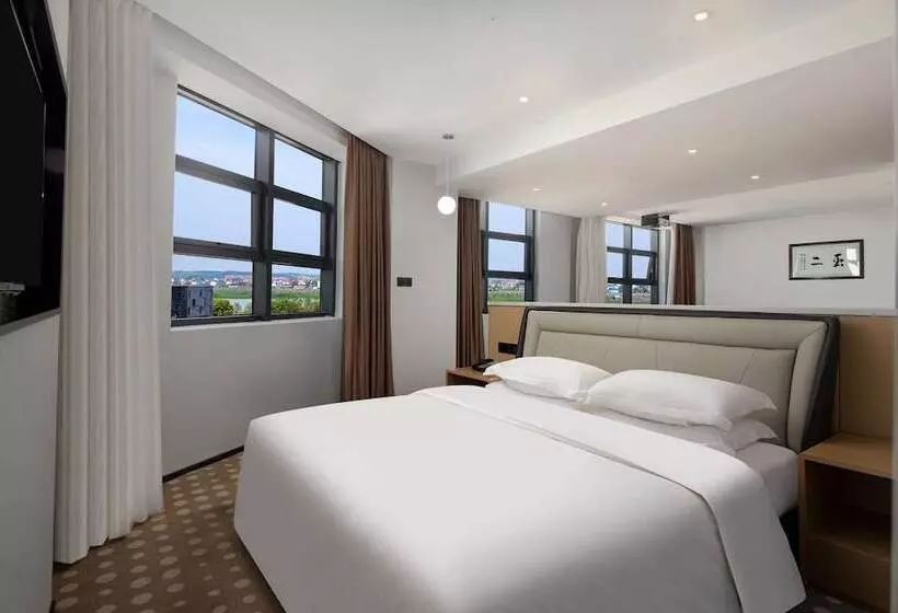 Microtel By Wyndham Miluo Downtown