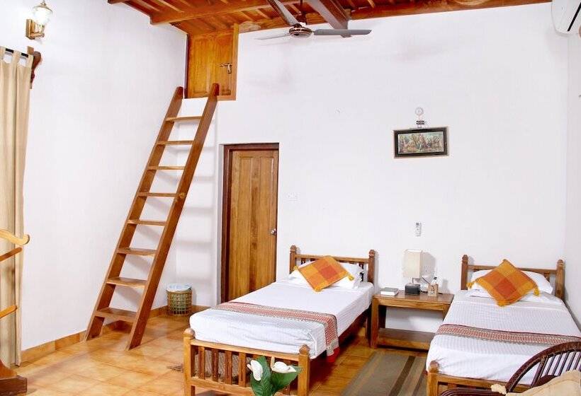 פנסיון Mannaas Veedu Retreat & Spa