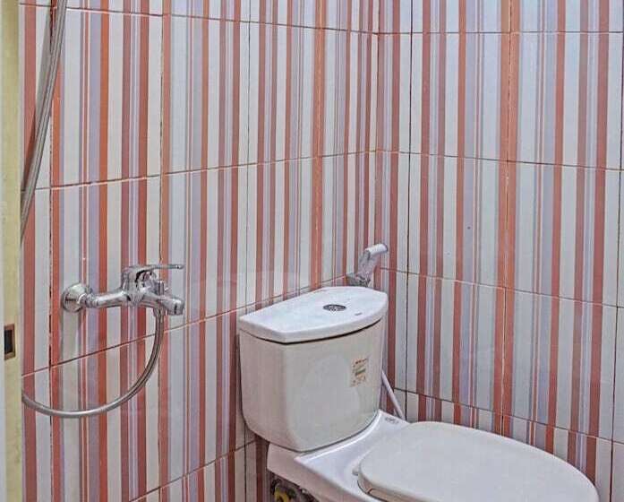 בית מלון כפרי Oyo 91649 Orange Homestay Makassar