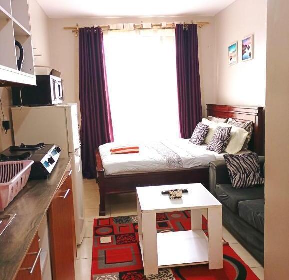 تختخواب و صبحانه Happy Go Lucky