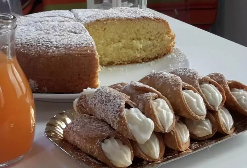 تختخواب و صبحانه Sogni D Oro