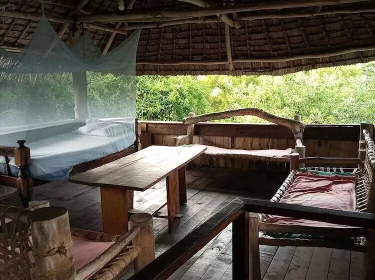 پانسیون Mida Creek Eco Camp   Cottage House