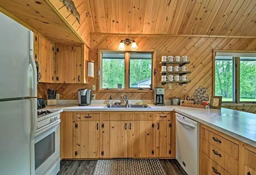 Riverfront Traverse City Cabin Near Snowmobiling!