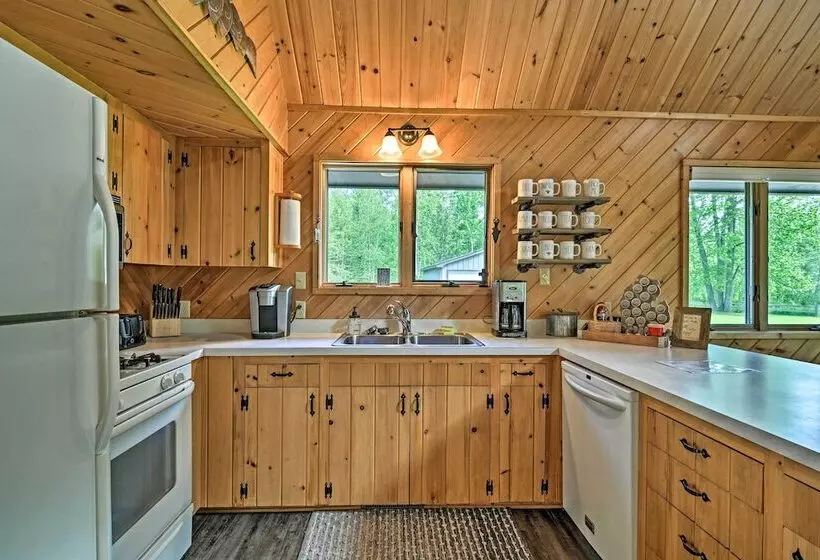 Riverfront Traverse City Cabin Near Snowmobiling!