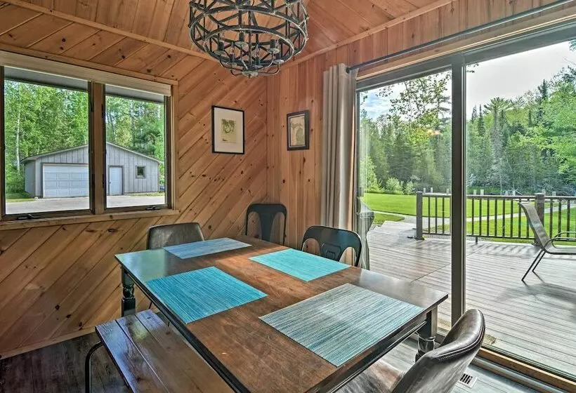 Riverfront Traverse City Cabin Near Snowmobiling!