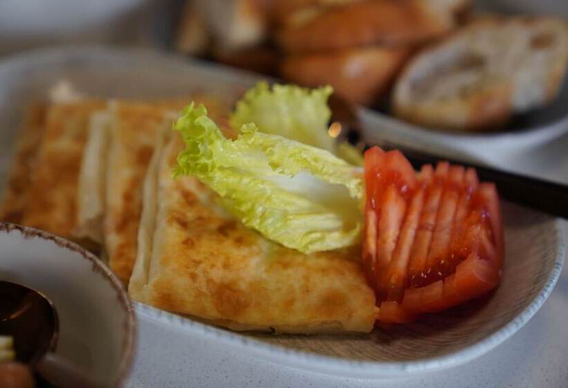 هتل Sinasos Evleri