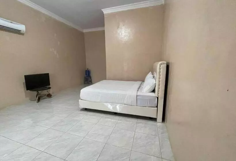 Hotelli Oyo 93033 Mutiara Homestay Syariah