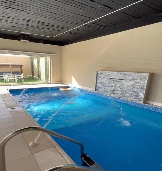 渡假胜地 شاليهات الفردوس الفندقية