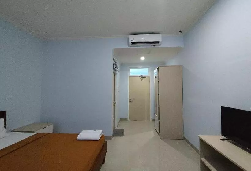 Hotelli Sutha Inn Syariah