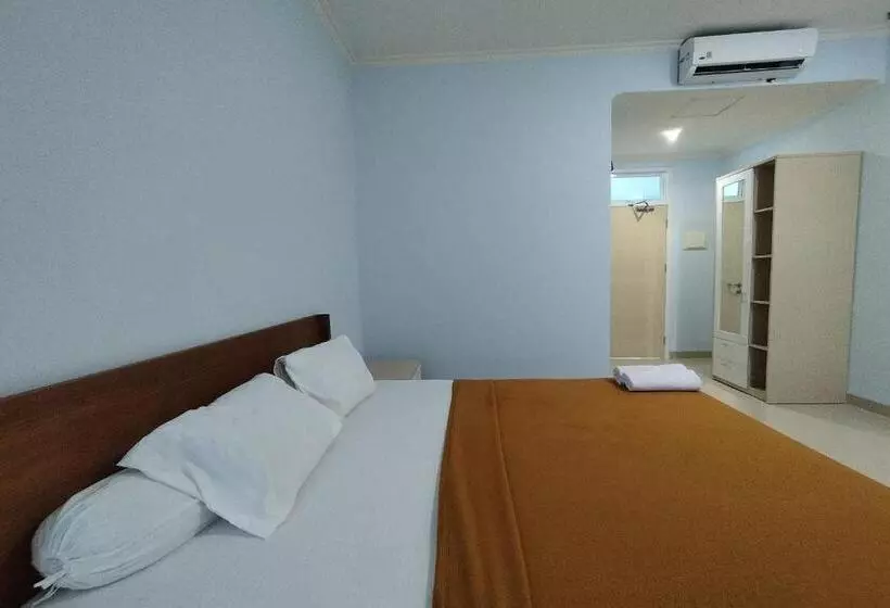 Hotelli Sutha Inn Syariah