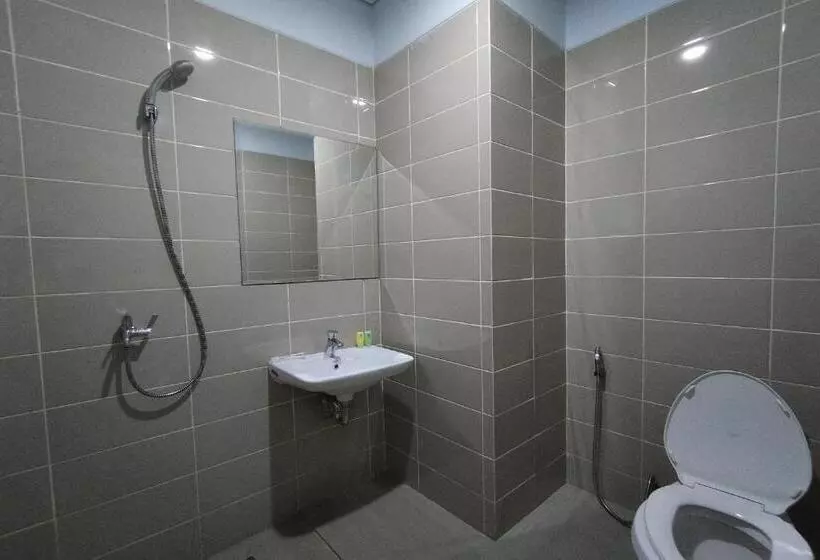 Hotelli Sutha Inn Syariah