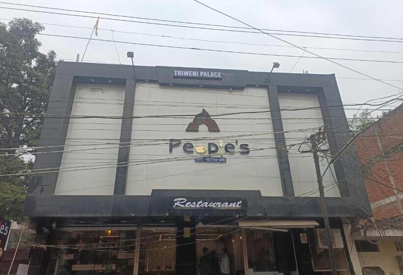 فندق Oyo Flagship Triweni Palace