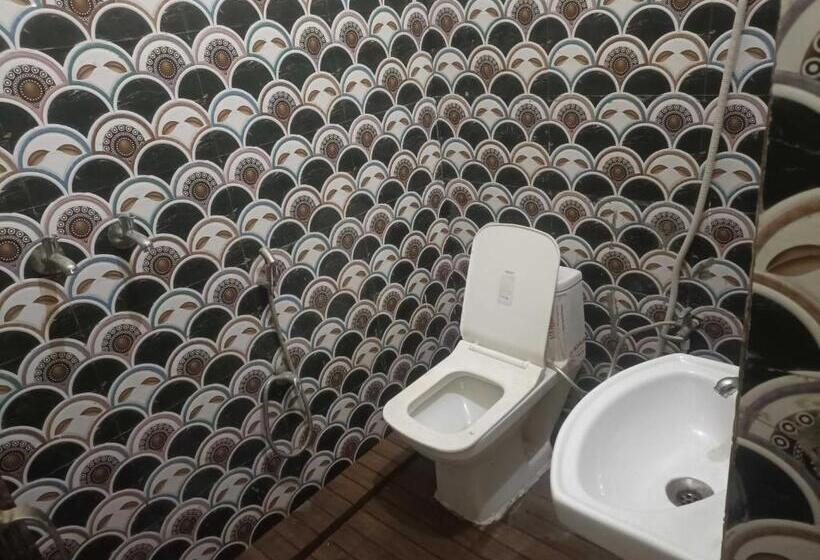 فندق Oyo Flagship Triweni Palace