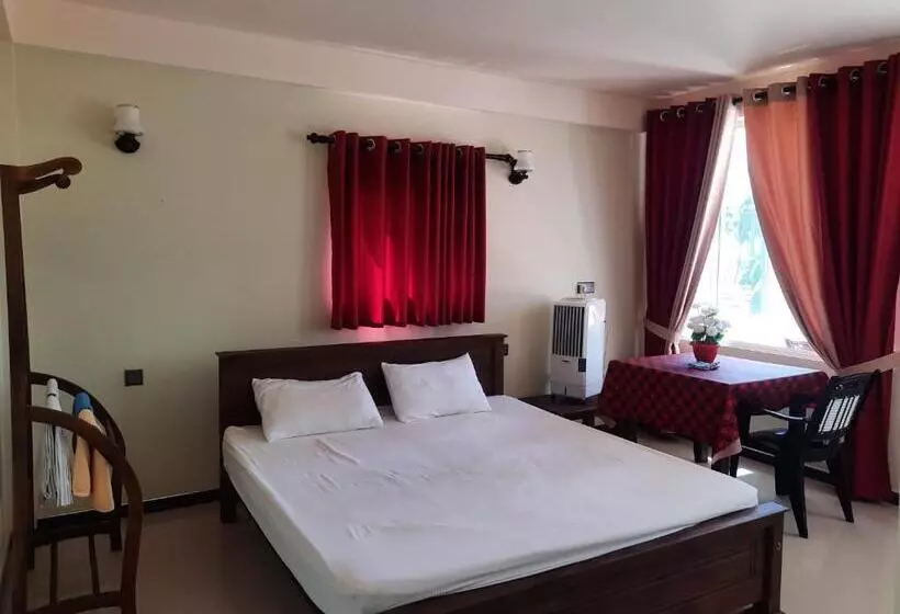 Hotelli Eventide Beach Resort