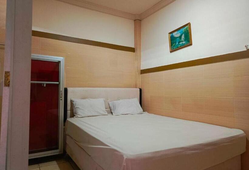 Отель Oyo 93278 Wisma Syariah Lahundape