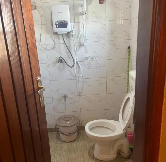 تختخواب و صبحانه Bukoto Kisaasi Suites 2