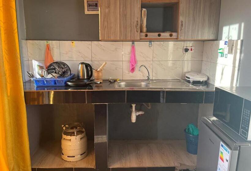 تختخواب و صبحانه Bukoto Kisaasi Suites 2