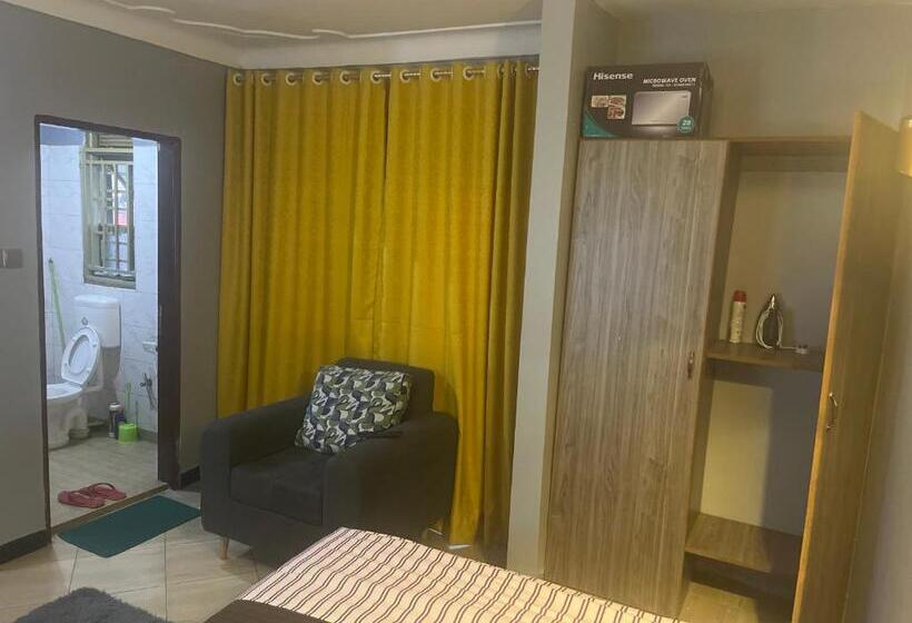 تختخواب و صبحانه Bukoto Kisaasi Suites 2