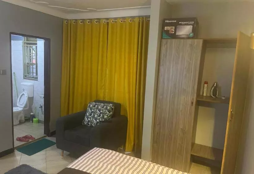 تختخواب و صبحانه Bukoto Kisaasi Suites 2
