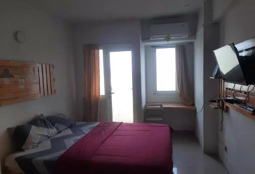 ホテル Oyo Life 93140 Apartment Grand Sentraland By Fahri