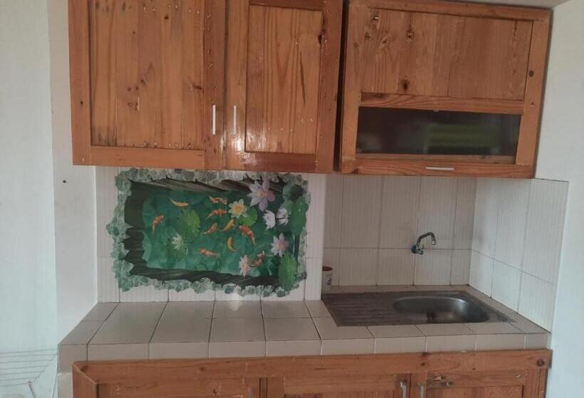 Отель Oyo Life 93140 Apartment Grand Sentraland By Fahri