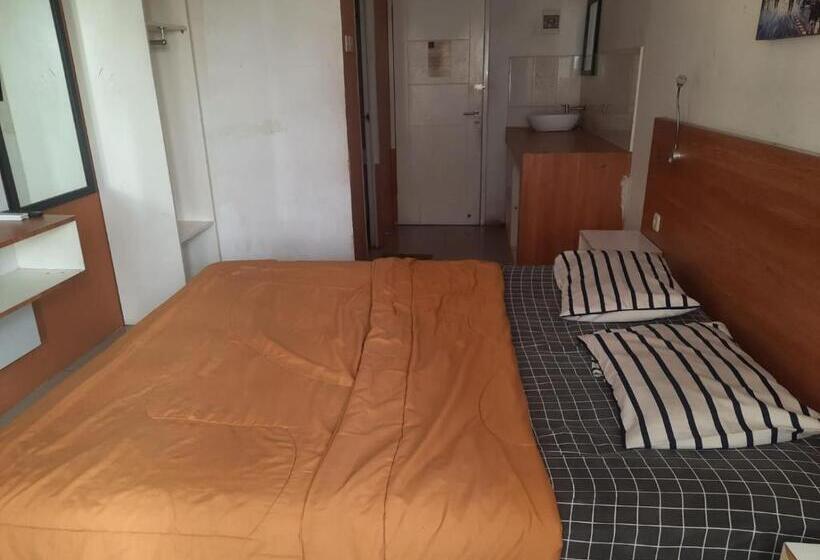 Отель Oyo Life 93140 Apartment Grand Sentraland By Fahri