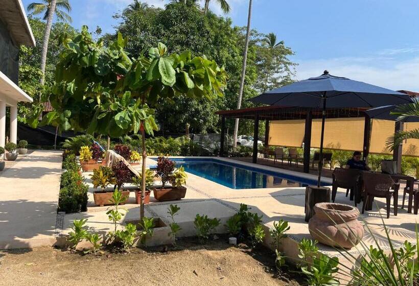 Natura Hotel & Villas