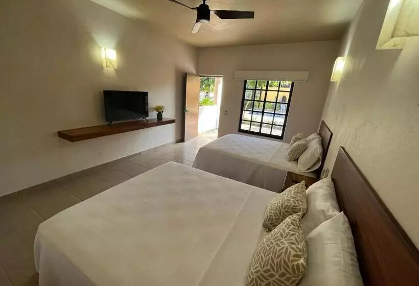 Natura Hotel & Villas
