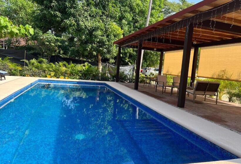 Natura Hotel & Villas