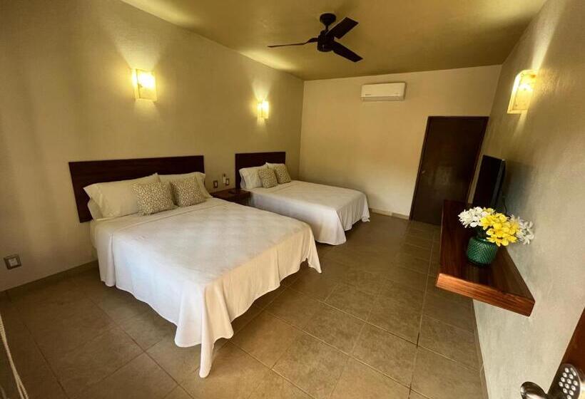 Natura Hotel & Villas