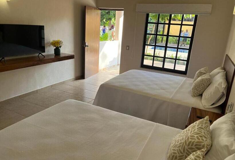 Natura Hotel & Villas