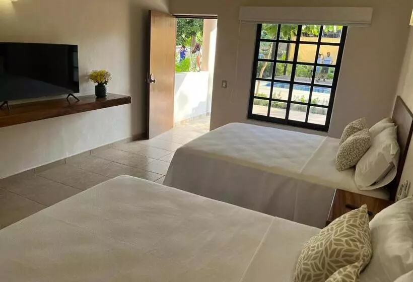 Natura Hotel & Villas