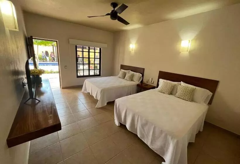 Natura Hotel & Villas